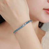 Vintage Sterling Silver & Rich Blue Topaz Tennis Bracelet
