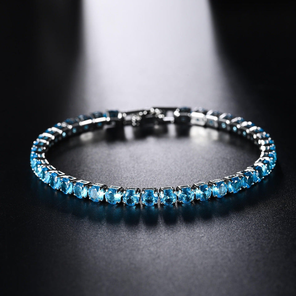 Vintage Sterling Silver & Rich Blue Topaz Tennis Bracelet
