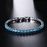 Vintage Sterling Silver & Rich Blue Topaz Tennis Bracelet
