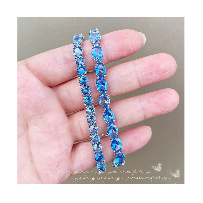 Vintage Sterling Silver & Rich Blue Topaz Tennis Bracelet
