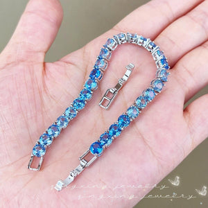 Vintage Sterling Silver & Rich Blue Topaz Tennis Bracelet