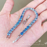 Vintage Sterling Silver & Rich Blue Topaz Tennis Bracelet